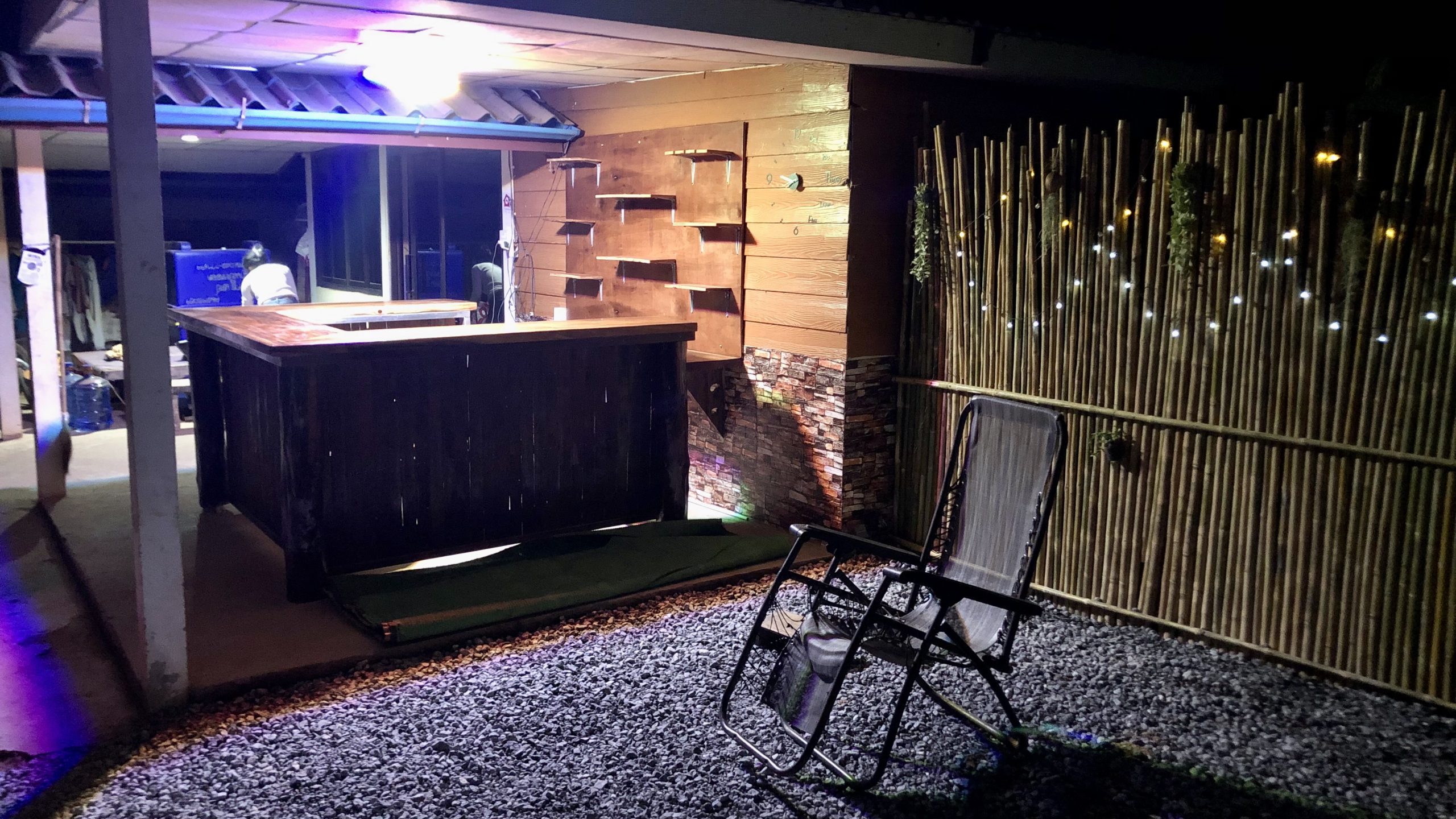 We have gray stones now on the outdoor area and some led lights at the bamboo fence